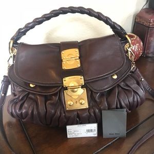 Miu Miu Matelasse Coffer Bag in Prugna